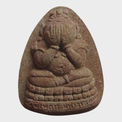 Thai amulet Phra Pidta Pangpakan Maha Lap – Red Wan Powder, Wat Ma Muang Khao, Nakhon Si Thammarat (BE 2553 / 2010)