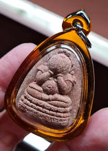 Thai amulet Phra Pidta Pangpakan Maha Lap – Red Wan Powder, Wat Ma Muang Khao, Nakhon Si Thammarat (BE 2553 / 2010)