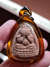 Thai amulet Phra Pidta Pangpakan Maha Lap – Red Wan Powder, Wat Ma Muang Khao, Nakhon Si Thammarat (BE 2553 / 2010)