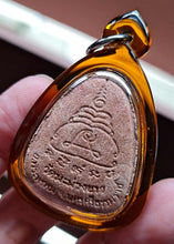 Thai amulet Phra Pidta Pangpakan Maha Lap – Red Wan Powder, Wat Ma Muang Khao, Nakhon Si Thammarat (BE 2553 / 2010)