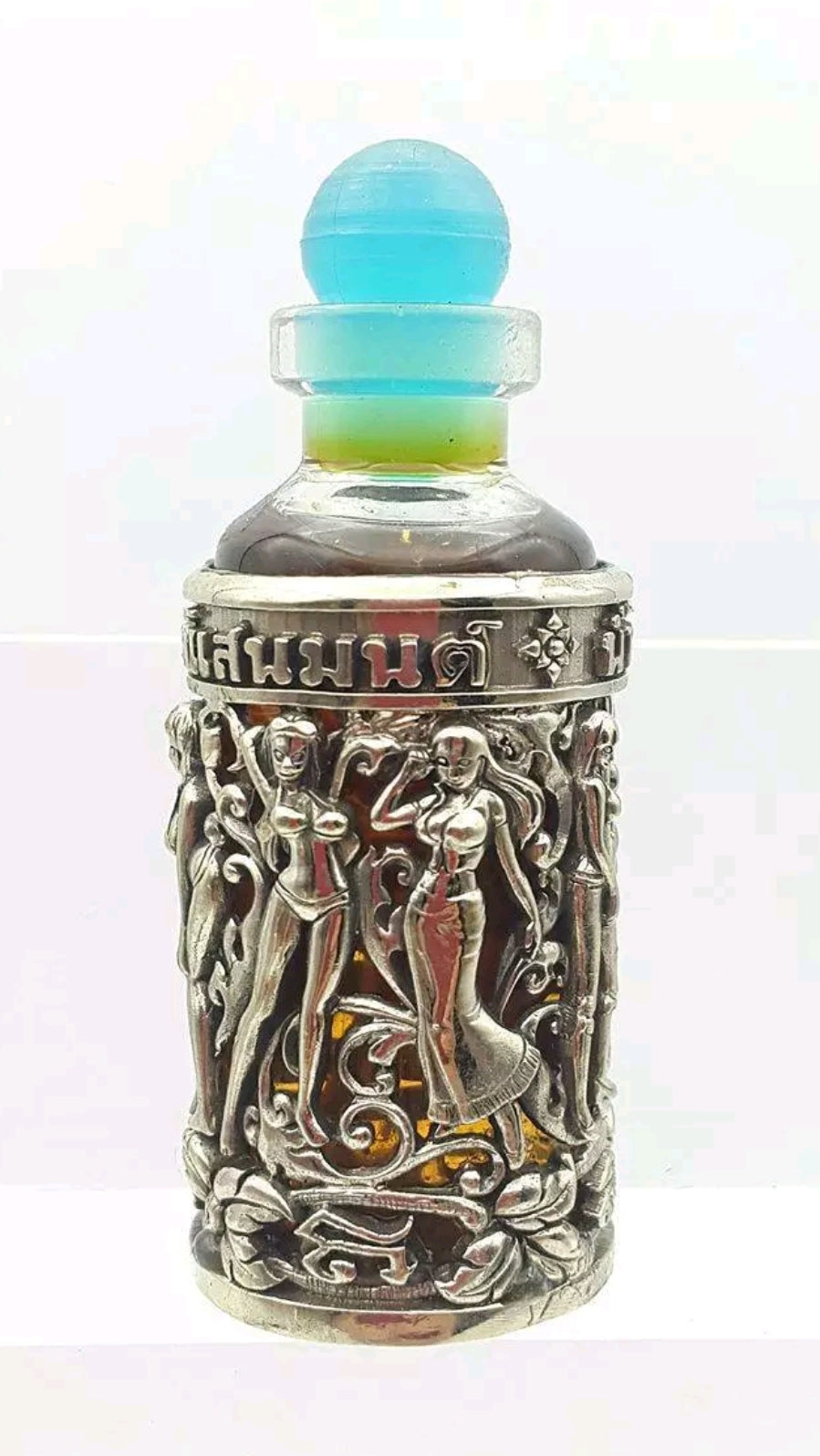 Thai amulet 7 Naree (7 lady) hypnotizing oil mesmerizing love attraction charms, love pendants
Blessed by Lp Kruba Thammamuni